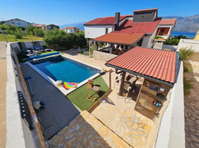 Villa Izziy by the beach with a sea view and heated pool